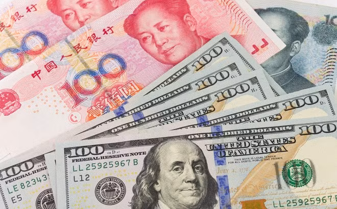 Trung Quốc tăng tỉ lệ sử dụng đồng nhân dân tệ được nhận định nhằm thách thức vị trí bá quyền của đồng USD trong hệ thống tài chính toàn cầu (Ảnh:businessinsider.com).