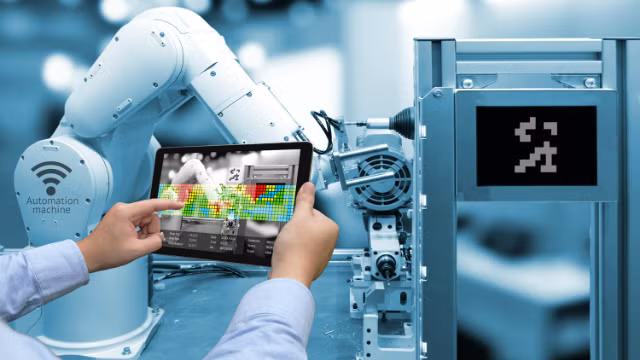 Các robot công nghiệp hiện đăng cạnh tranh với lao động có tay nghề thấp. Ảnh minh họa
