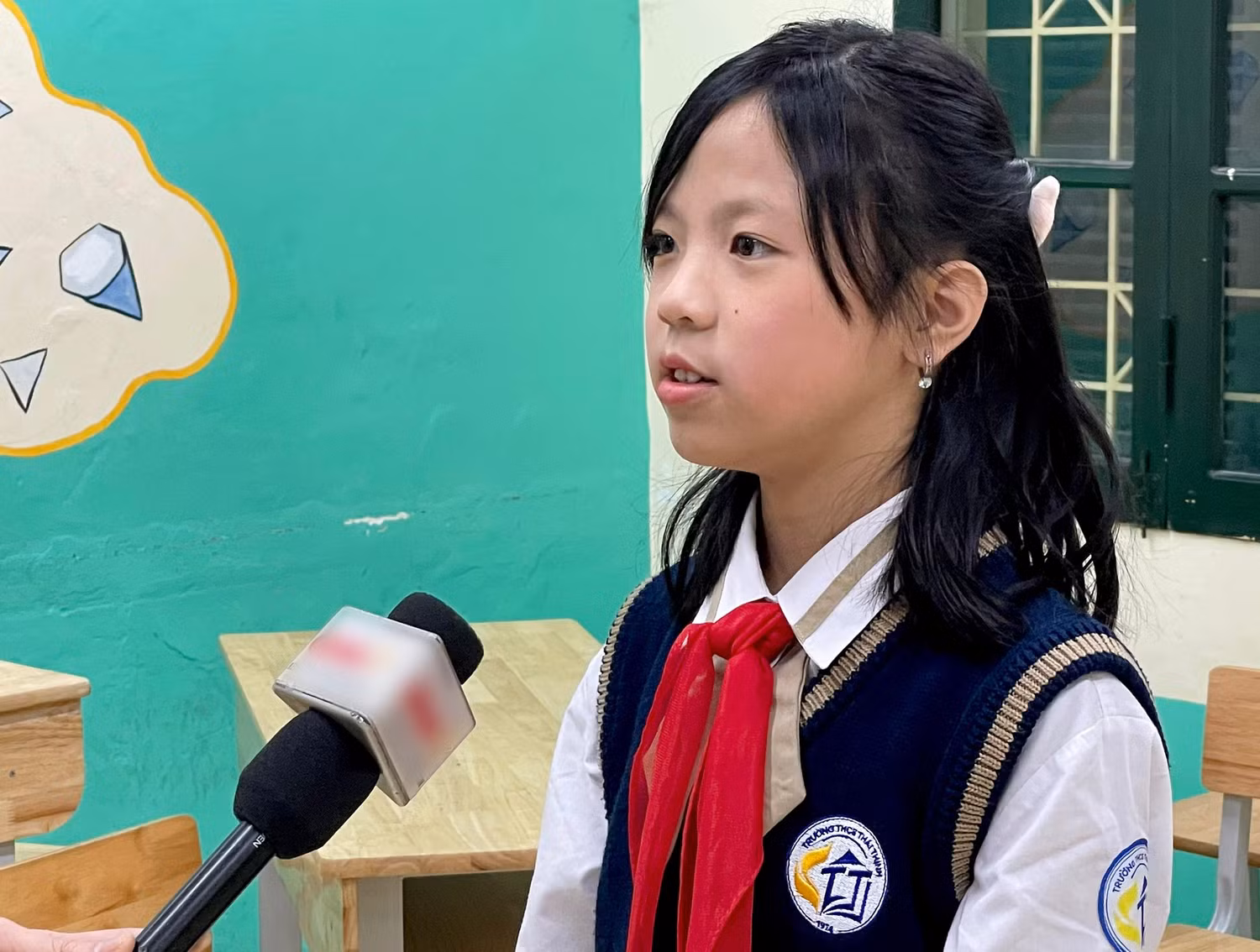 Học sinh Hà Linh lớp 6A01 Trường Trung học cơ sở Thái Thịnh, quận Đống Đa, Hà Nội. Ảnh: Nhà trường cung cấp.